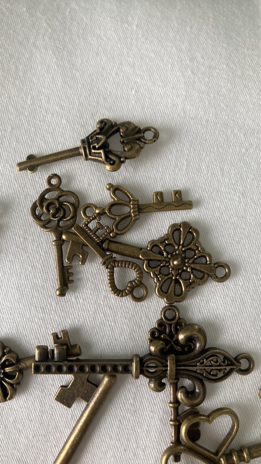 Sold- key charms